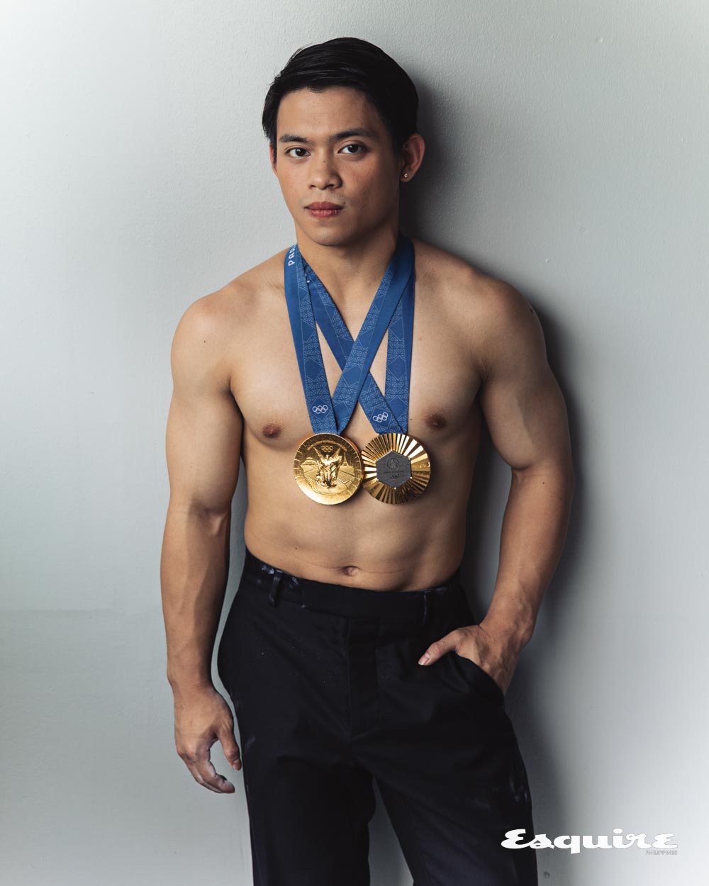 Carlos Yulo with two gold medals