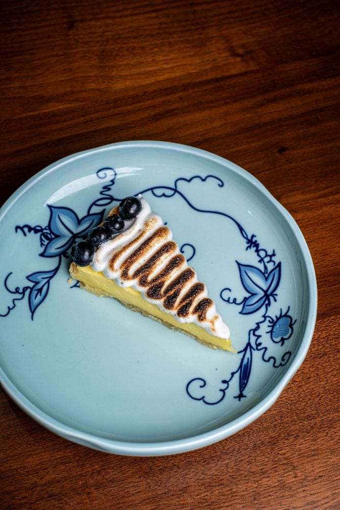 CALAMANSI TART WITH BLACK PEPPER MERINGUE.