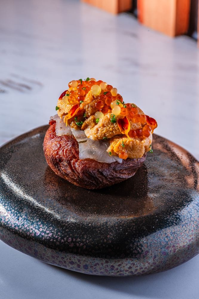 CRABFAT DOUGHNUT WITH ALIGUE XO, LARDO, UNI AND IKURA