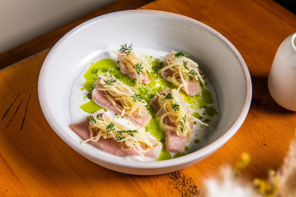 HAMACHI KINILAW WITH GREEN APPLE, CORIANDER, COCONUT VINAIGRETTE.