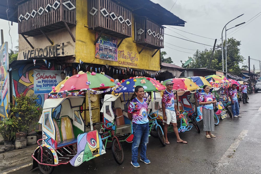 The Trisikad tour guides welcomes visitors