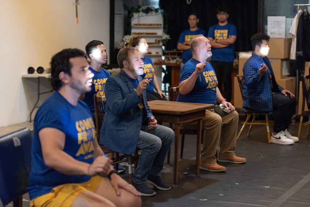Come From Away rehearsing a scene