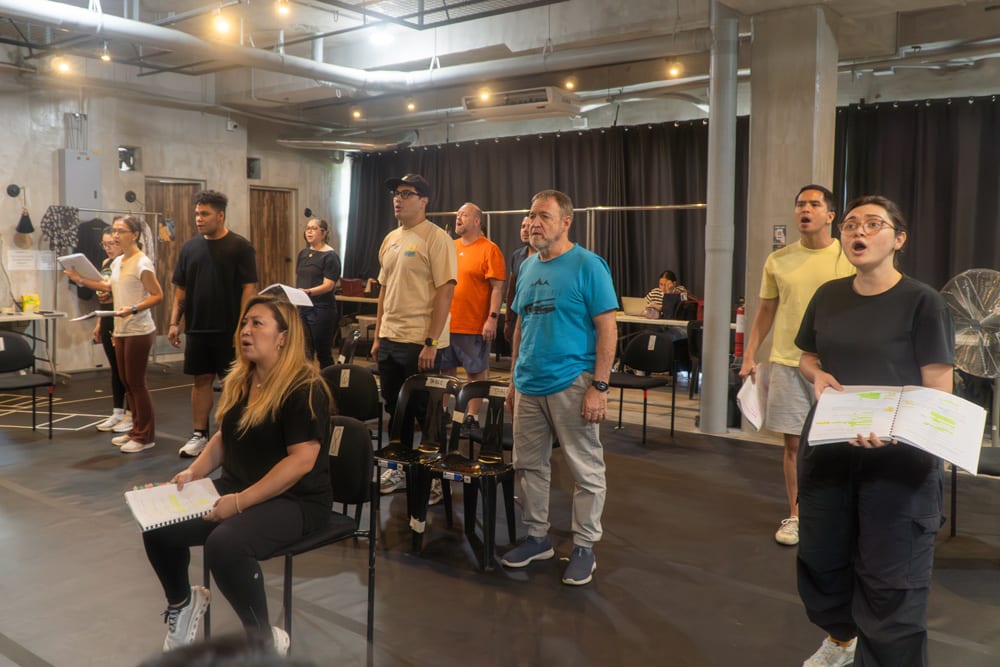 Come From Away rehearsing a scene