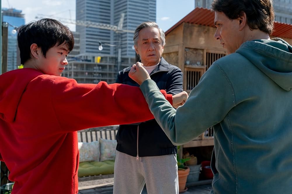 Jackie Chan, Ralph Macchio, and Ben Wang in Karate Kid: Legends (2025)