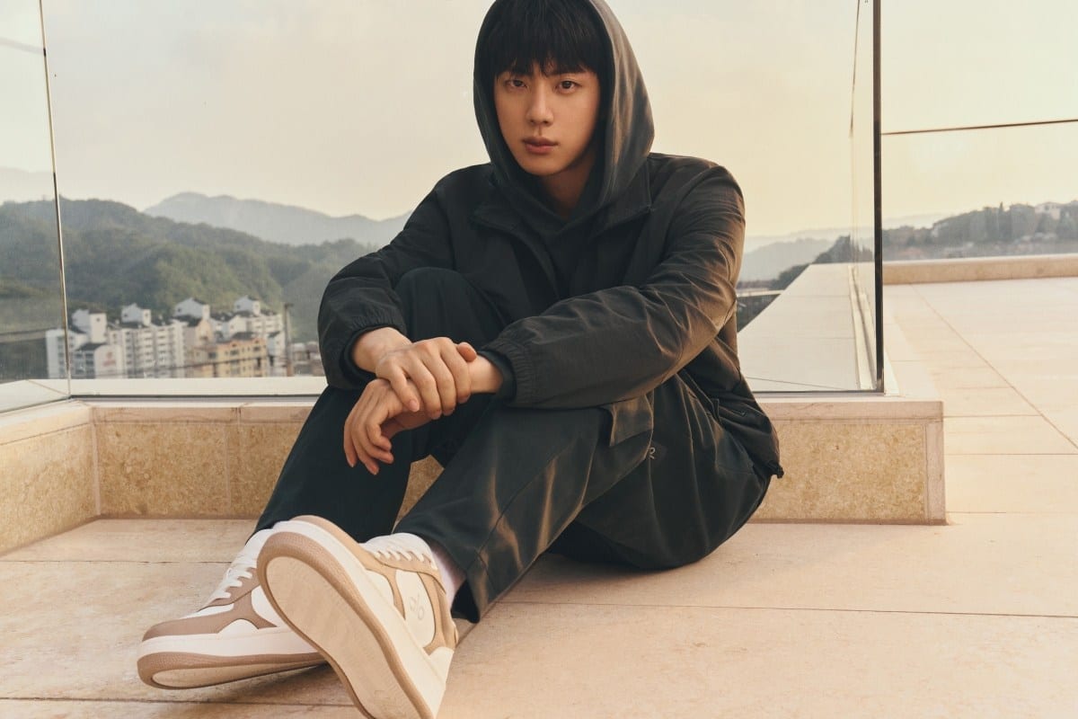 Jin of BTS wearing Alo