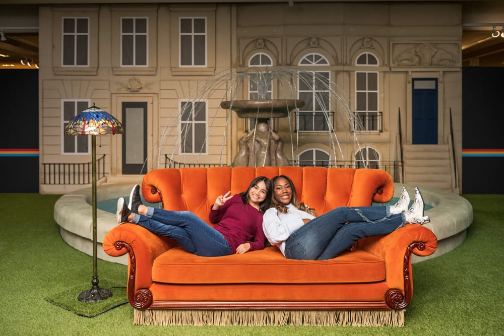 The Friends Experience orange sofa
