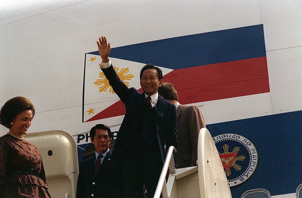 Defense Minister Juan Ponce Enrile with President Ferdinand Marcos boarding to a Philippine Airlines Boeing 747-200 Presidential Flight